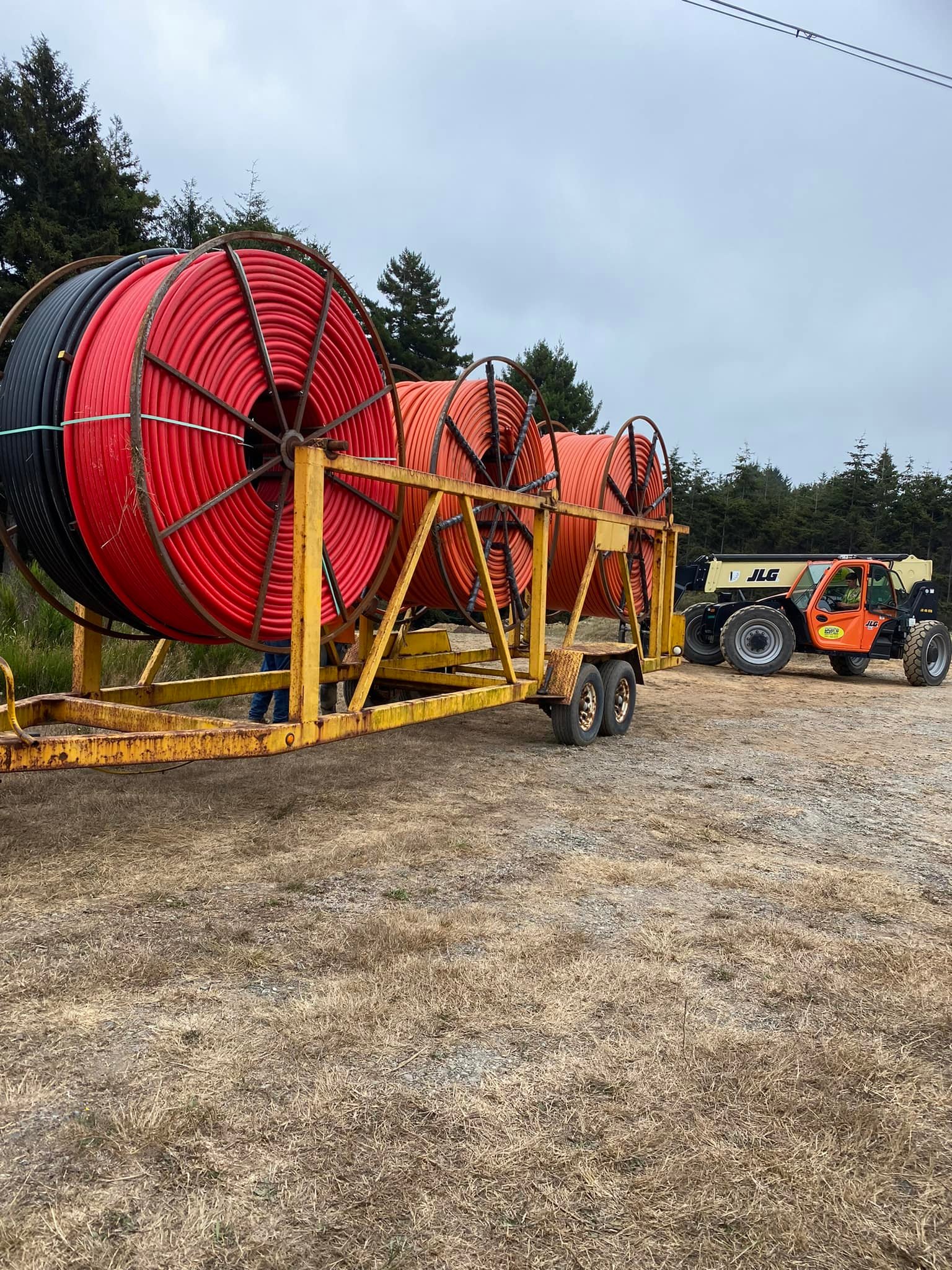 Large conduit reels on trailer