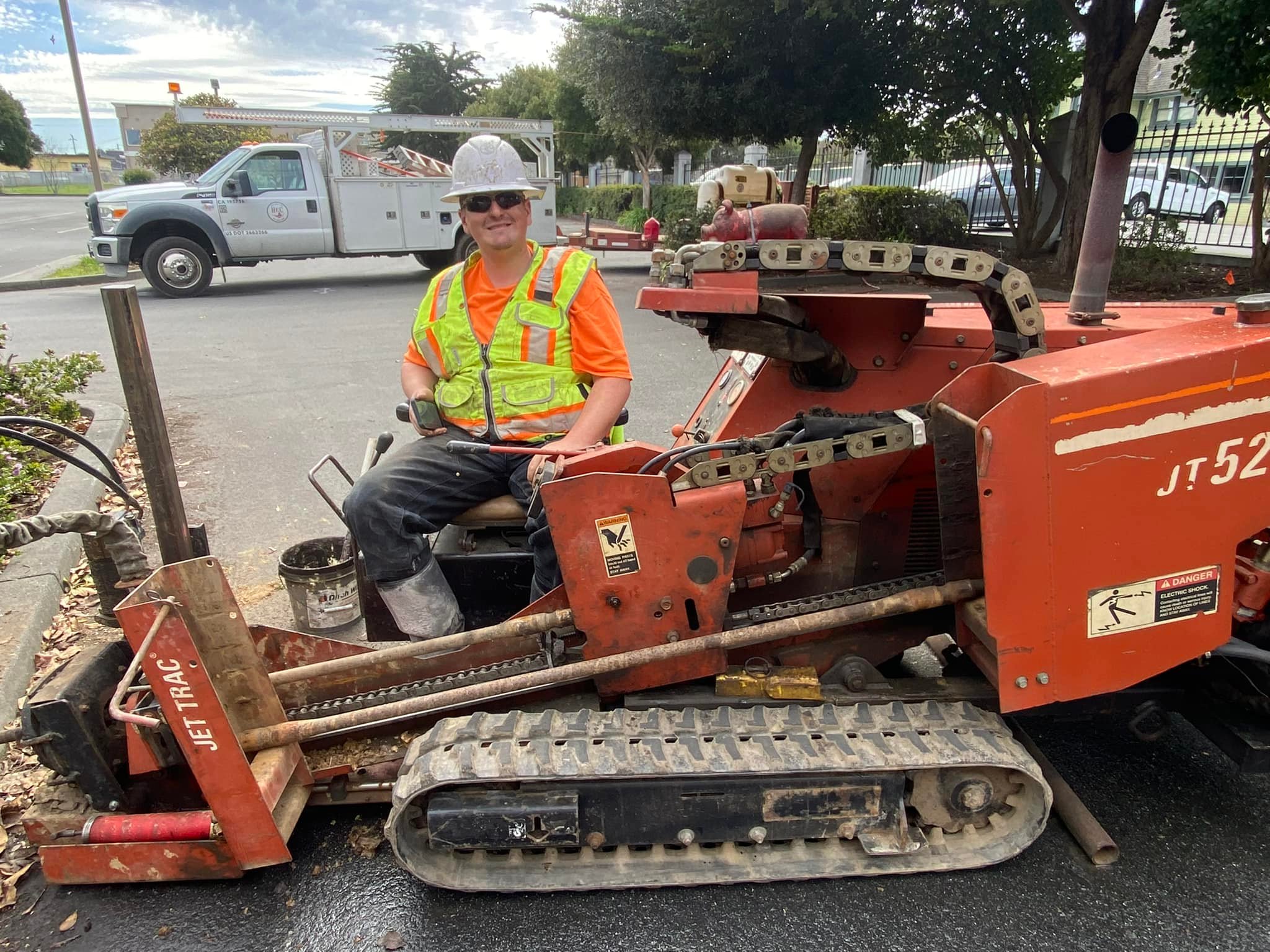 Operator on Ditch Witch drill rig